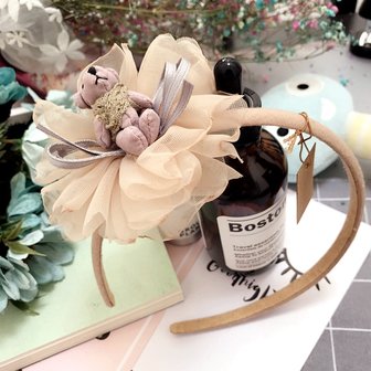 Diadeem/haarband bloem met beer